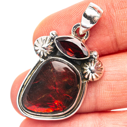 Sterling silver teardrop pendant with red ammolite and dark maroon stone, top bail