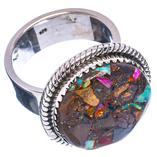 Adjustable sterling silver ring with twisted band and multicolor opal matrix oval