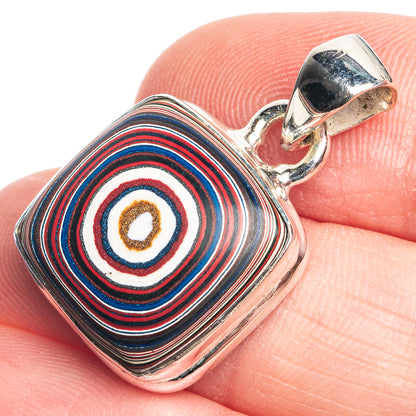 Sterling silver pendant with colorful inlaid swirl circle and bail loop
