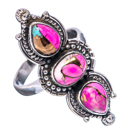 Magenta pink oval stone ring in .925 sterling silver with turquoise accent, three settings.