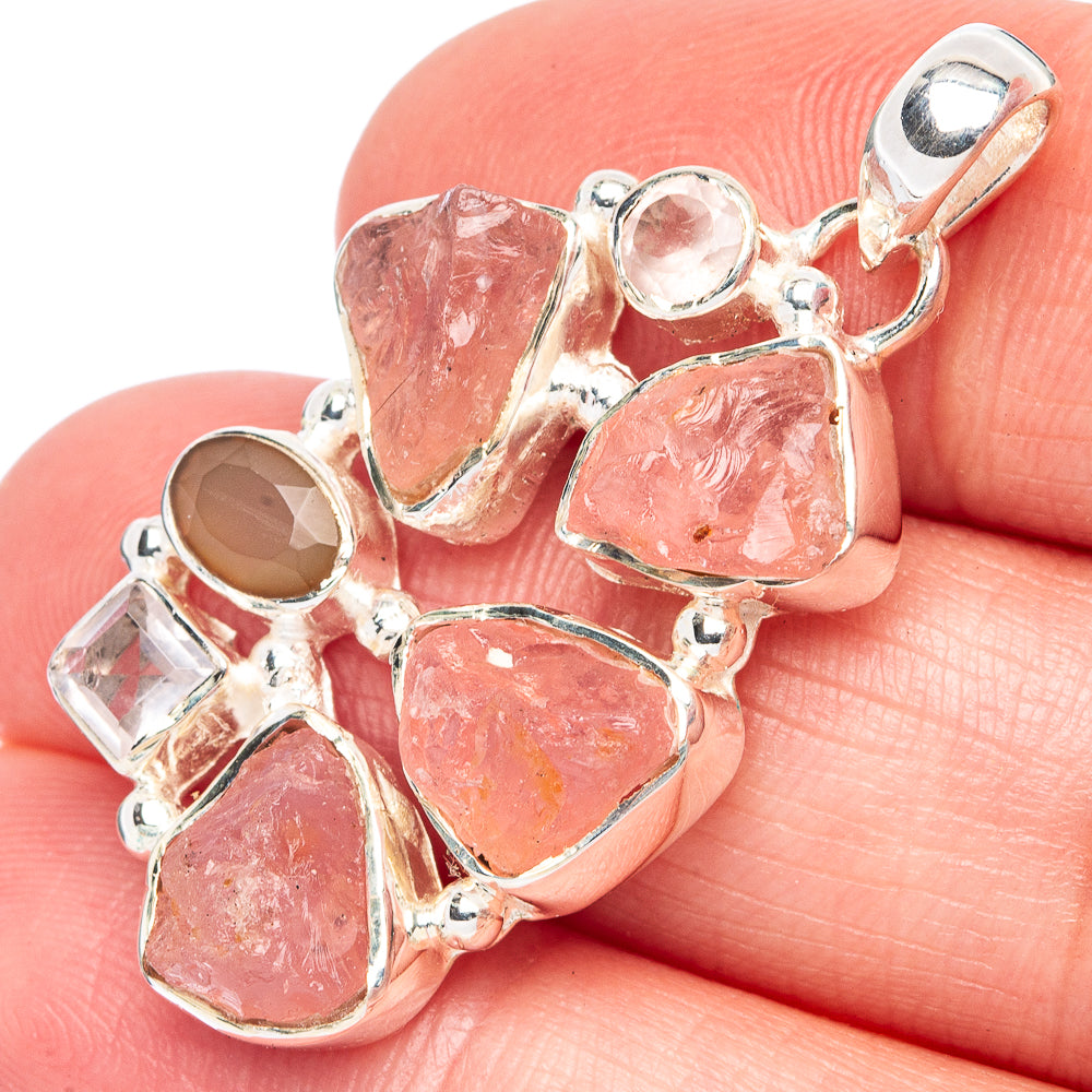 925 sterling silver pendant with rough pink rose quartz stones and clear accents