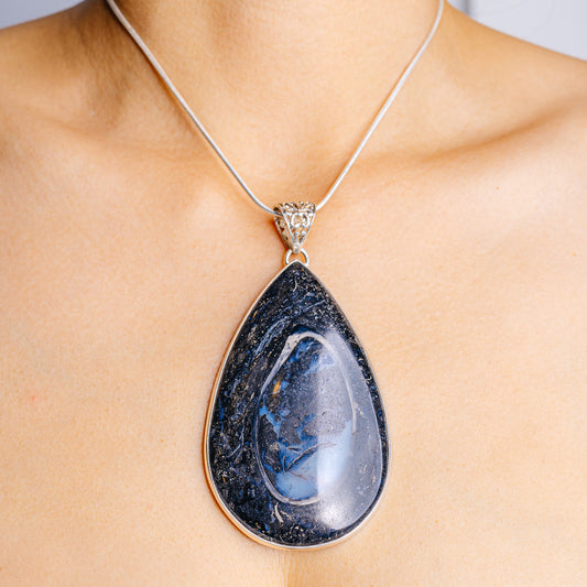 Teardrop turritella agate pendant in .925 sterling silver, blue stone with silver frame