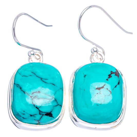 Turquoise oval cabochon drop earrings in .925 sterling silver, front view