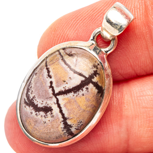 Sonora dendritic pendant in .925 sterling silver, oval with bail and clasp top.