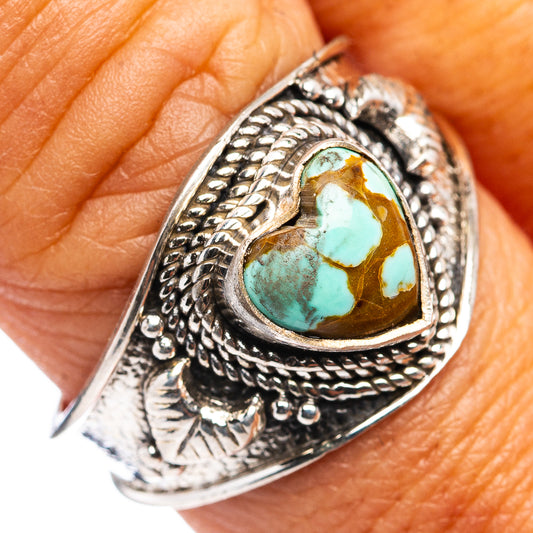 Sterling silver heart turquoise ring with rope-like frame, close-up