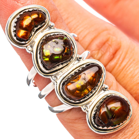 Sterling silver ring with four oval fire agate stones, amber and iridescent flashes.