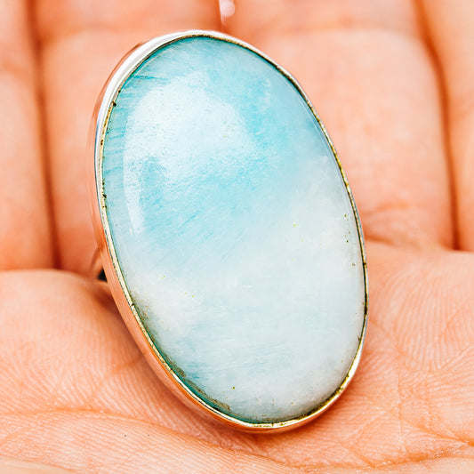 Oval blue aragonite ring with .925 sterling silver band and bezel, front view