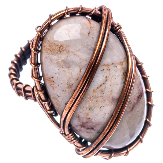 Oxidized copper wire-wrapped oval teardrop agate ring, textured bezel