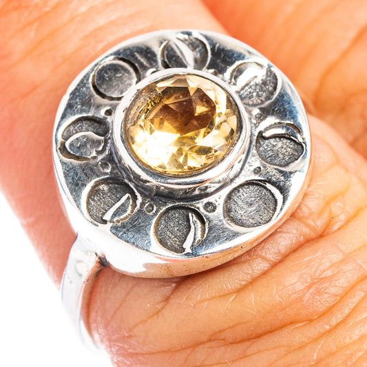 Sterling silver ring with oval citrine gemstone and ornate halo setting