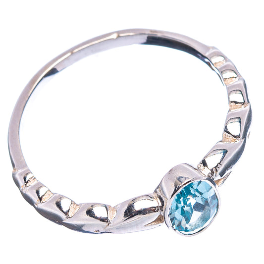 Sterling silver oval blue topaz ring with small round accents