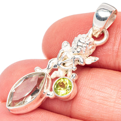Sterling silver angel pendant with faceted teardrop stone and round green gemstone bail