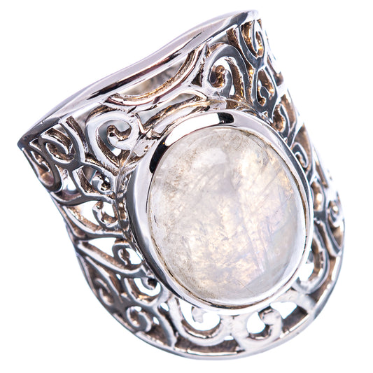 Oval iridescent moonstone sterling silver filigree ring with ornate cutouts