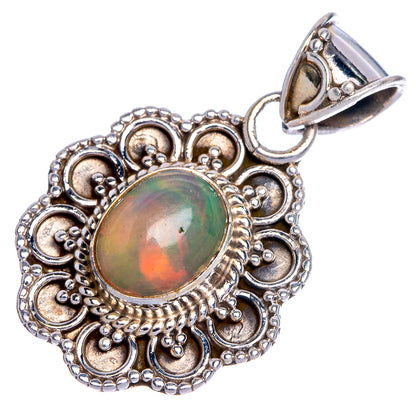 Ethiopian iridescent oval opal pendant in ornate sterling silver filigree, with bail