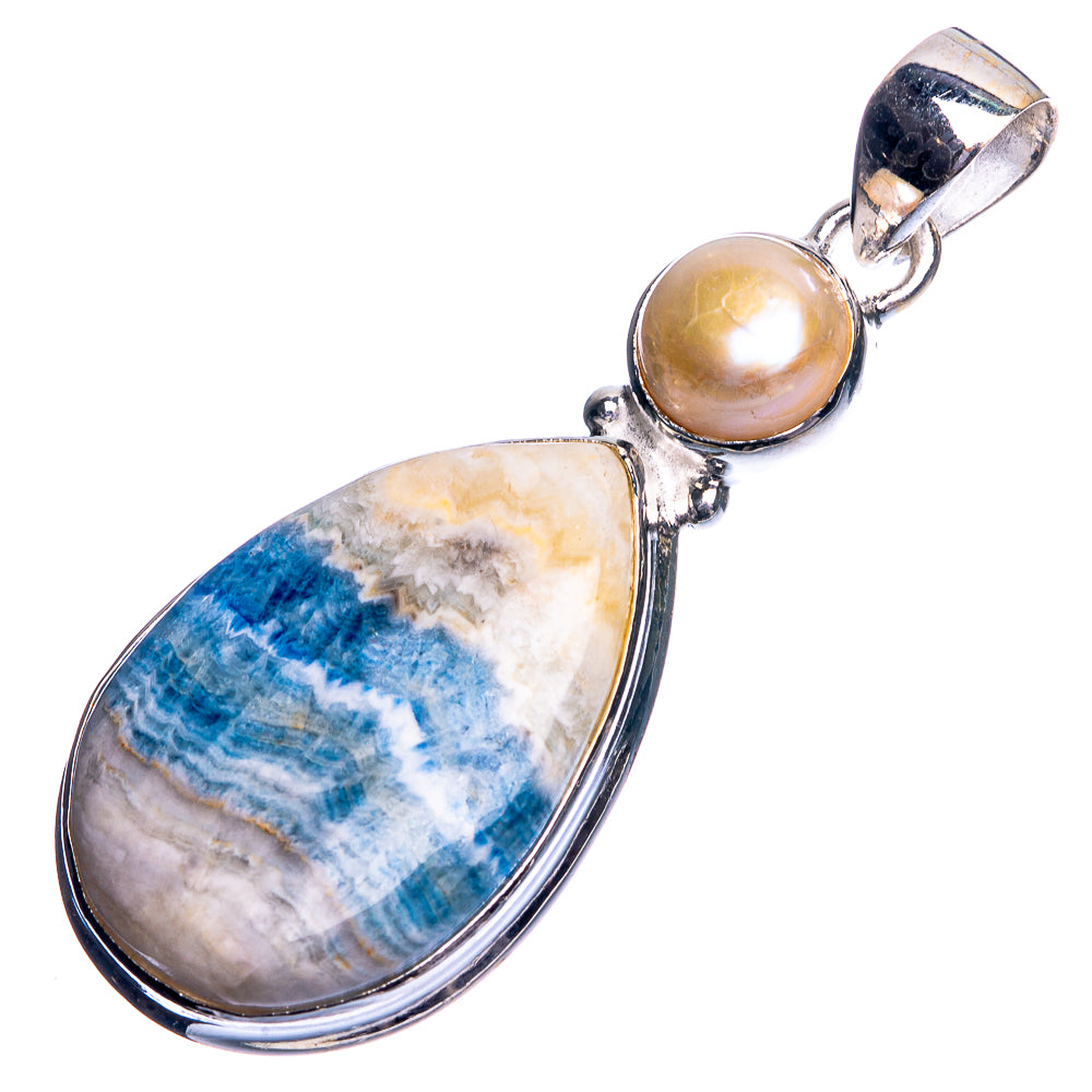 Sterling silver pendant featuring a blue scheelite teardrop and cultured pearl, hanging style