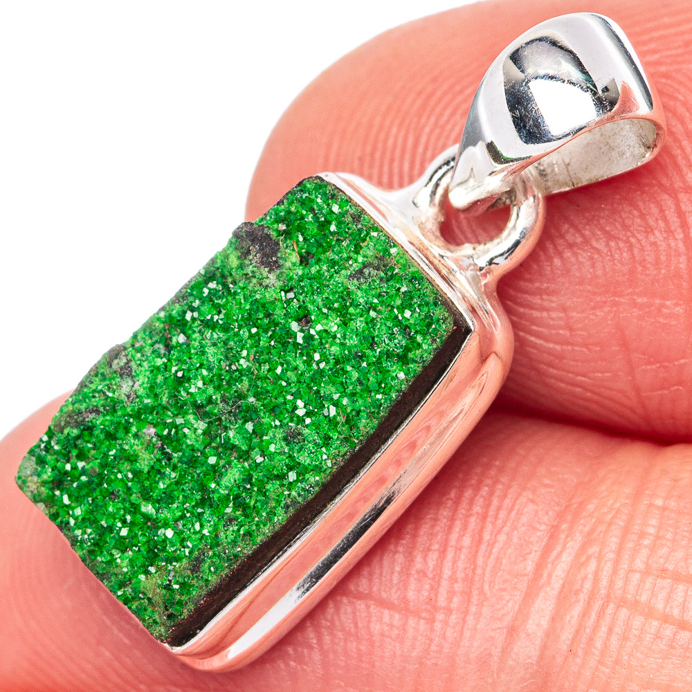 Sterling silver pendant with green rectangular druzy stone and top loop bail