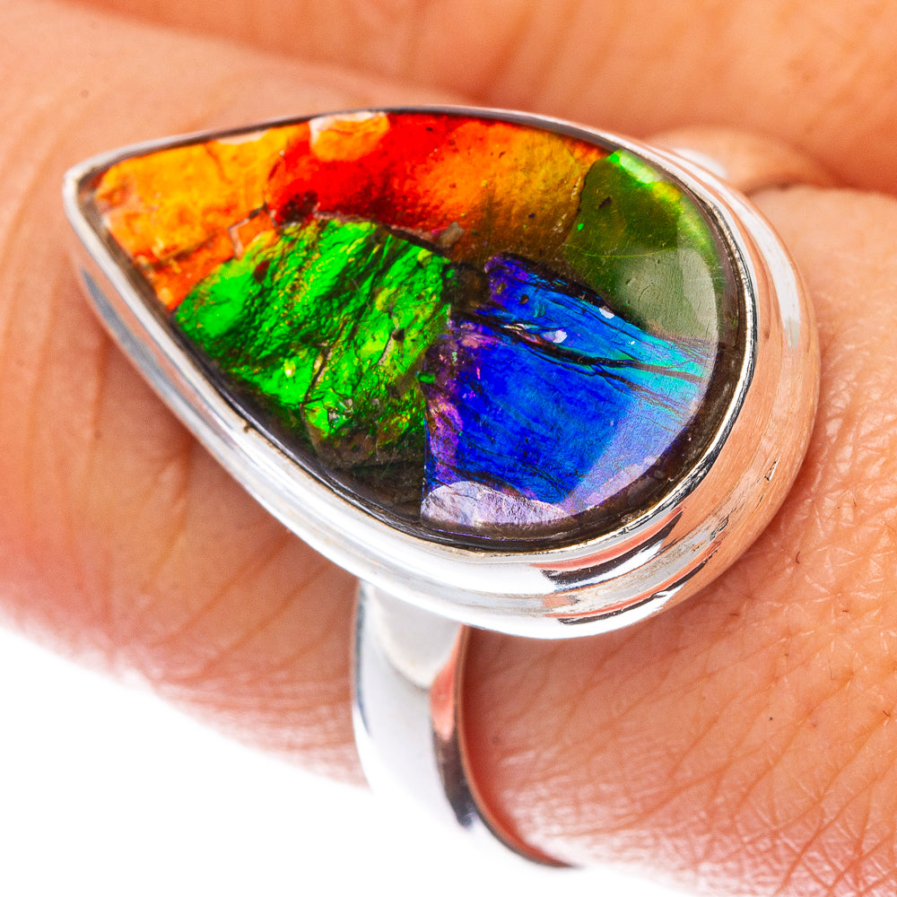 Sterling silver ammolite ring with oval multicolor gemstone, bezel-set on band