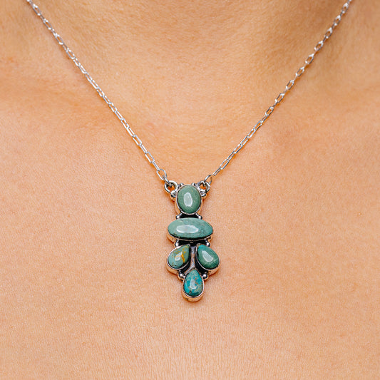 Sterling silver turquoise pendant necklace with clustered oval and teardrop cabochons