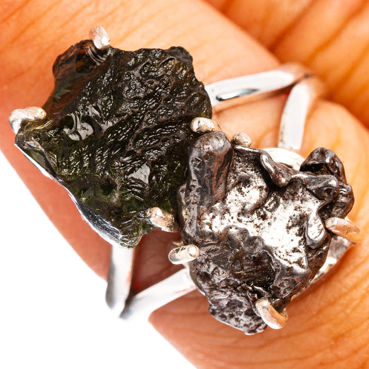 Sterling silver ring with rough dark meteorite and small silver prongs