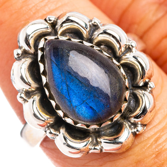 Sterling silver labradorite oval ring with ornate bezel and vivid blue center stone