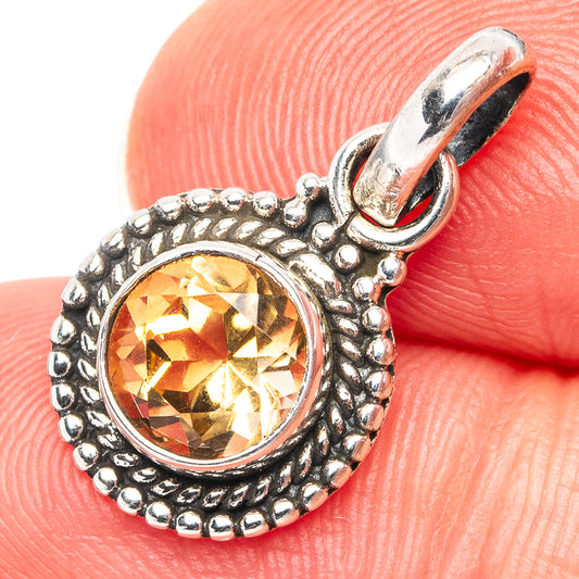 Sterling silver citrine pendant with round faceted yellow gemstone and beaded halo bail