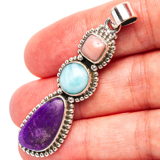 Sterling silver pendant with pink, blue, and purple gemstone stones, bail top
