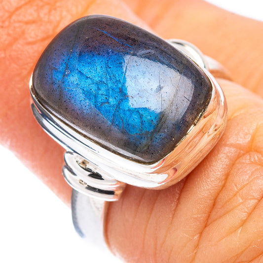 Sterling silver ring with oval labradorite gemstone, blue-gray flash set in bezel
