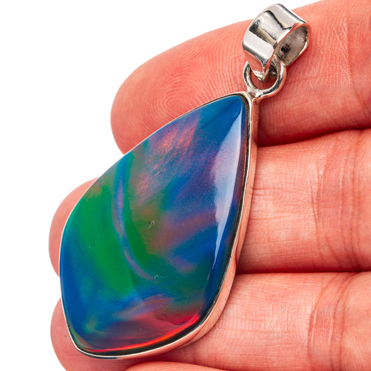Iridescent teardrop opal pendant in .925 sterling silver bail