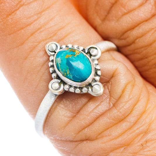 Sterling silver turquoise cabochon ring with oval blue stone and scalloped bezel