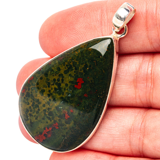 Teardrop bloodstone pendant with red spots in 925 sterling silver bezel