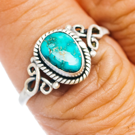 Turquoise oval cabochon sterling silver ring with rope-edge bezel
