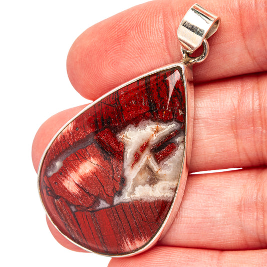 Teardrop rainbow jasper pendant with .925 sterling silver bail, red and white stone