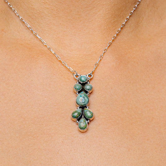 Turquoise pendant necklace with .925 sterling silver chain and oval stone cluster