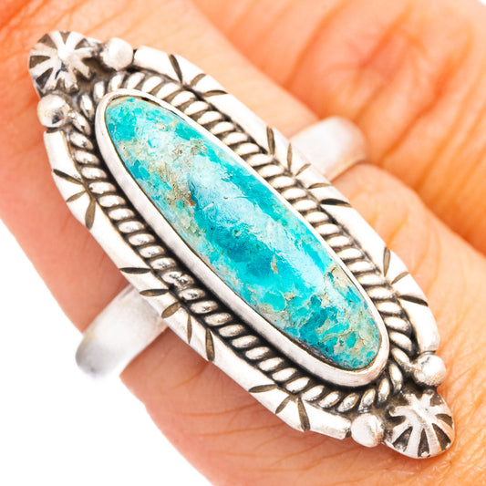 Adjustable sterling silver turquoise oval ring with ornate leaf border