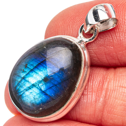 Oval labradorite pendant in .925 sterling silver with faceted blue flash