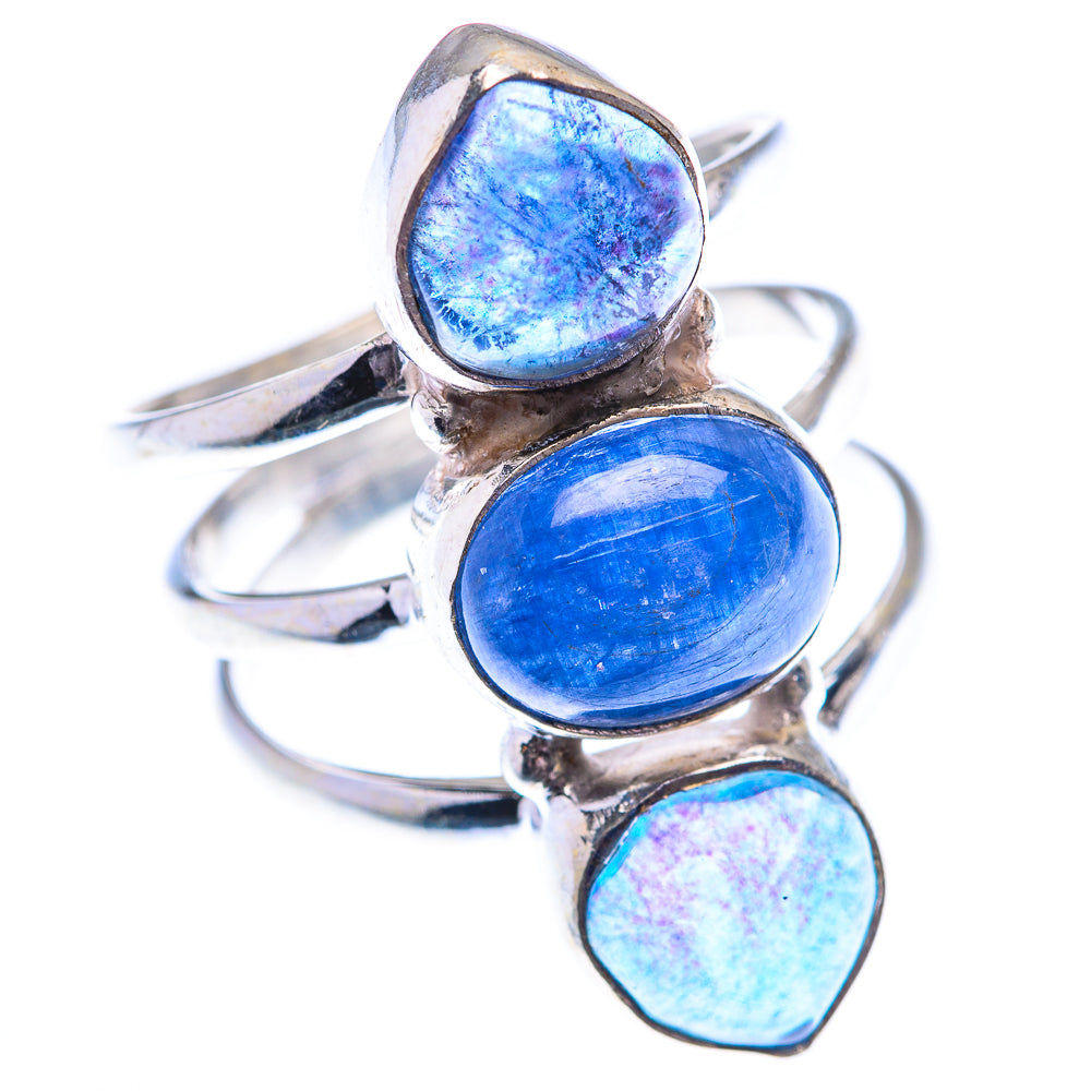 Sterling silver three-stone ring with oval blue gemstones, adjustable open band