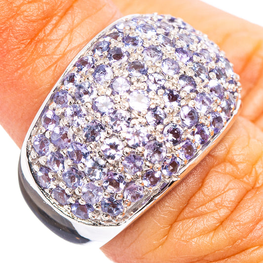 Sterling silver oval tanzanite-style cluster ring with faceted purple gemstones