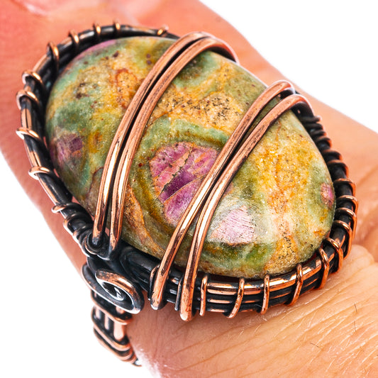 Oxidized copper wire wrap ring with oval green and purple gemstone cabochon
