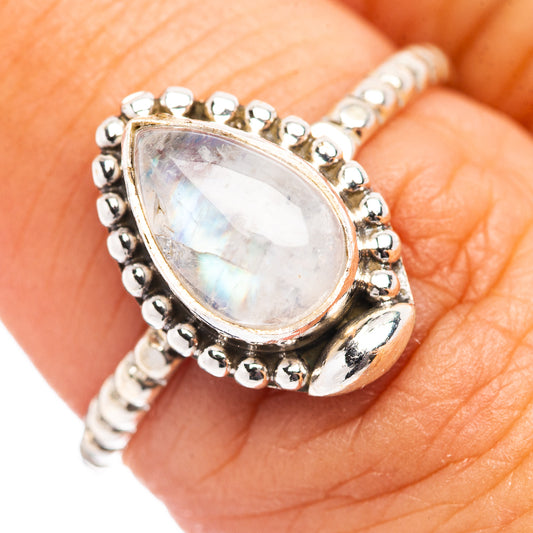 Teardrop moonstone ring in .925 sterling silver, prong-set with beaded halo
