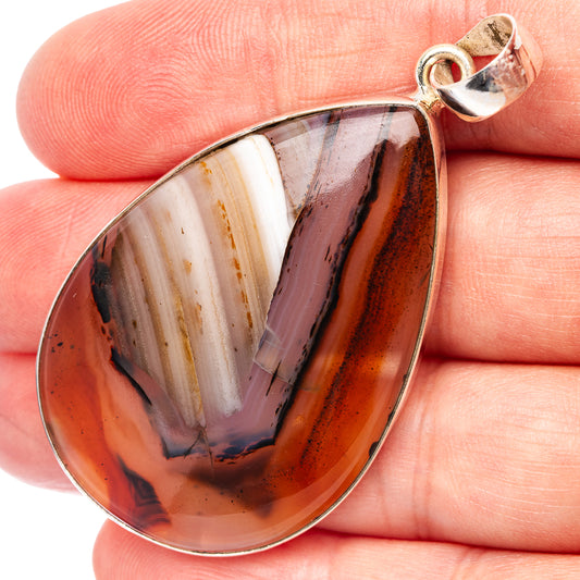 Teardrop Montana agate pendant in .925 sterling silver bezel, multicolor striped stone