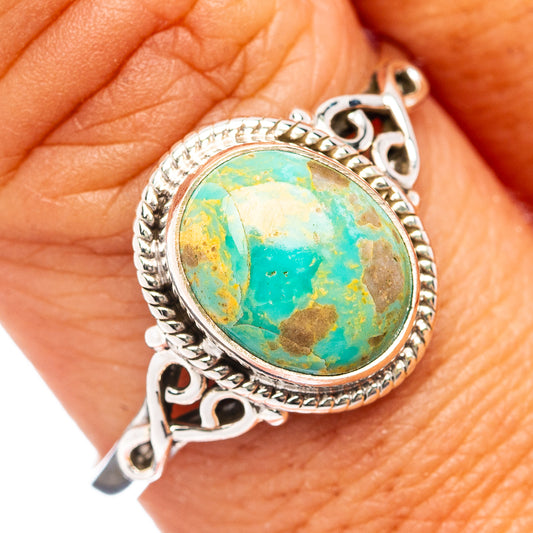 Turquoise cabochon ring in .925 sterling silver, oval stone with ornate bezel details
