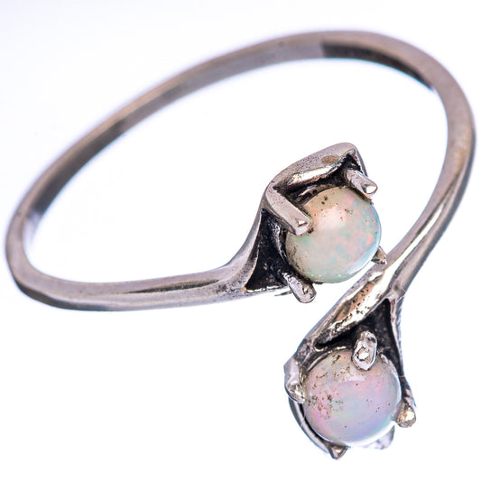 Sterling silver opal ring with two oval cabochons, size 8, side view