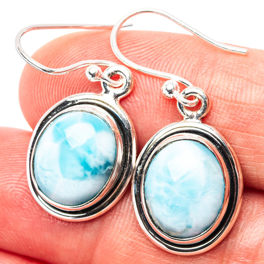 Sterling silver Larimar drop earrings with two oval blue stones in bezel settings