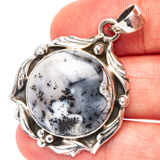 Sterling silver dendrite opal pendant, round cabochon in ornate leaf frame