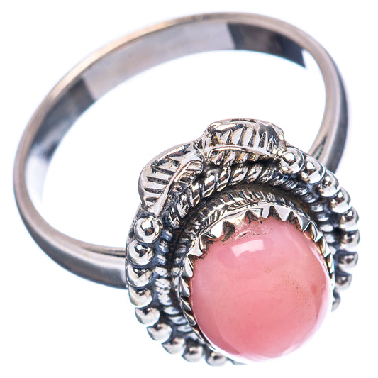 Pink opal .925 sterling silver ring with scalloped metalwork and pink oval stone