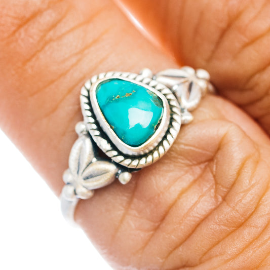 Sterling silver turquoise teardrop ring with rope bezel and leaf details