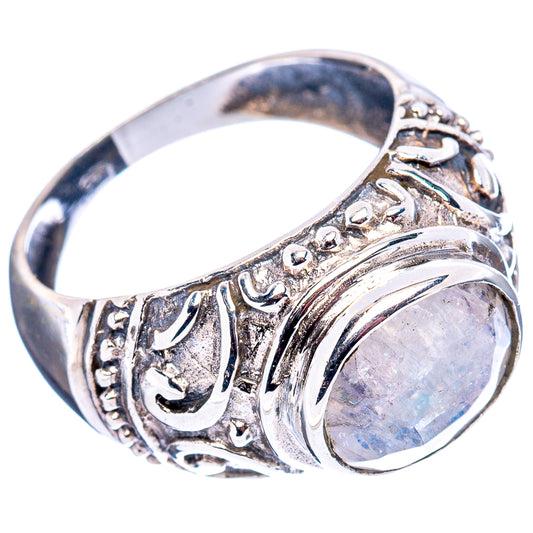 Sterling silver filigree ring with oval iridescent moonstone, decorative scrollwork