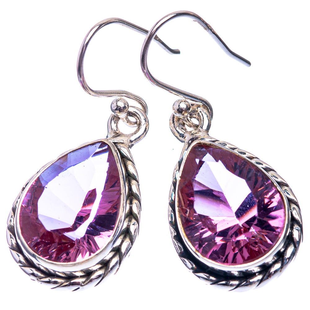 Silver teardrop drop earrings with faceted purple/pink gemstone and fishhook clasps