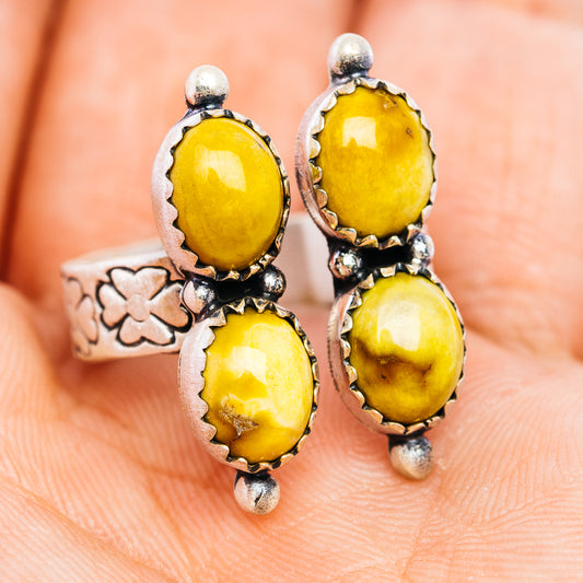 Sterling silver ring with three oval yellow cabochon stones and bead prongs