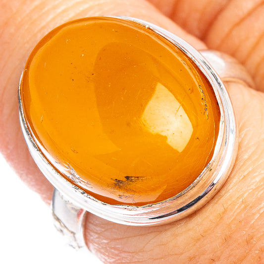 Oval amber cabochon sterling silver ring, size 7.75, yellow-orange gemstone close-up