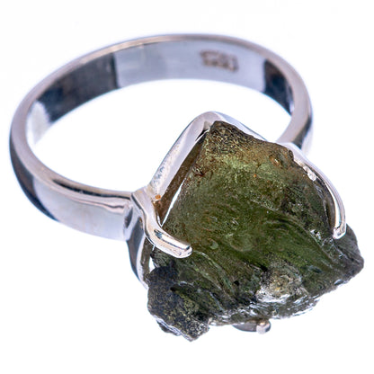 Sterling silver moldavite ring with rough green stone on raised claw settings